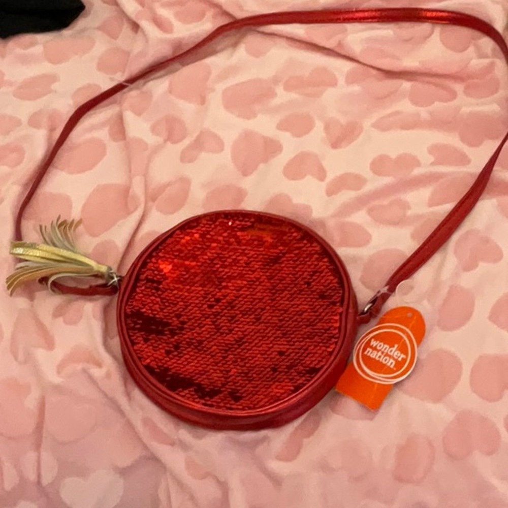 A red and silver sequin purse for kids